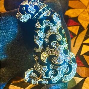 SOLD
Heidi Daus “Cats-A-Nova" Enamel and Crystal Brooch